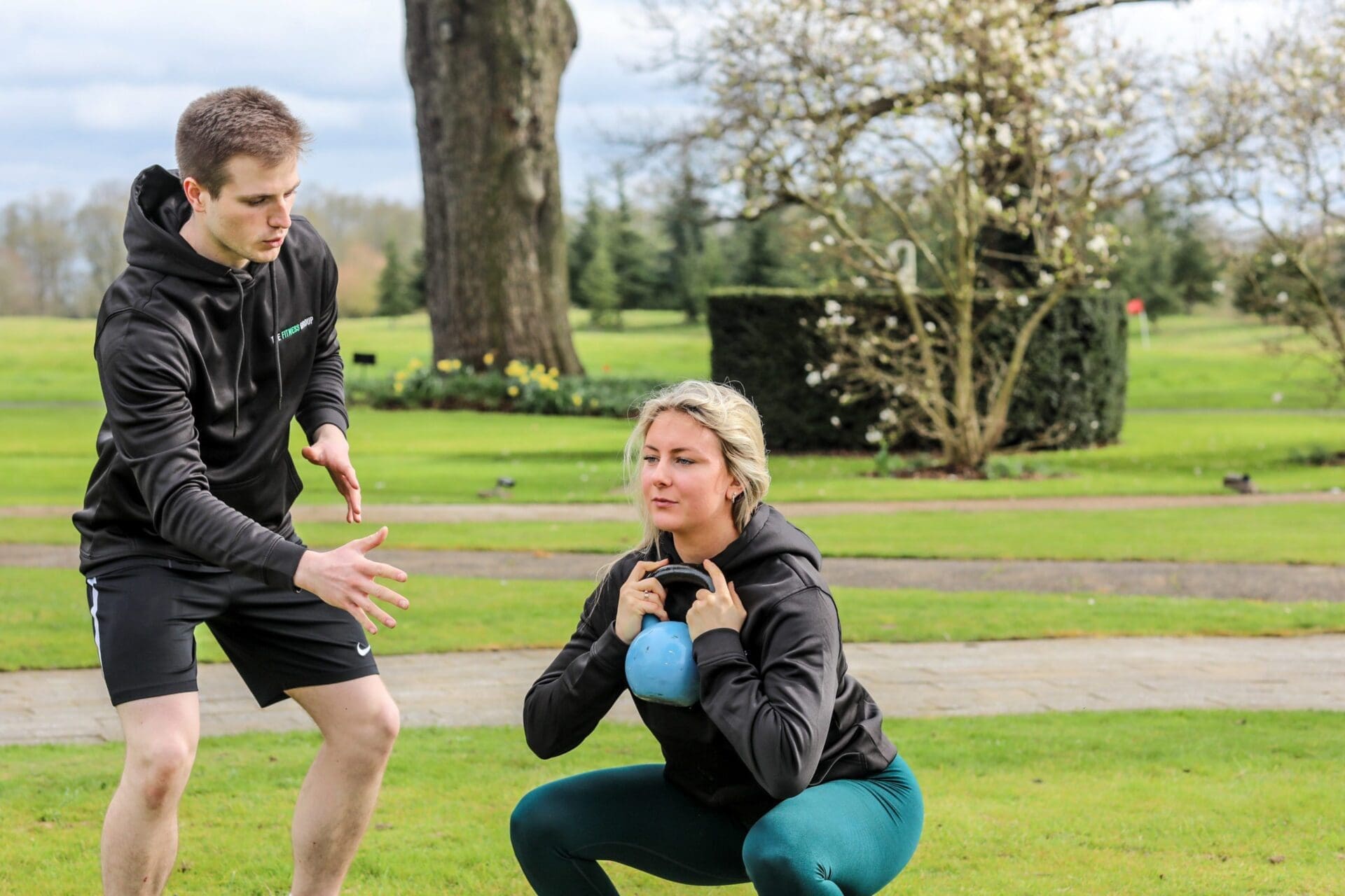 Kettlebells Students Doing Ketllebell Squat Exercises
