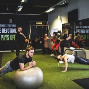 Group of Personal Trainer Students Working Out