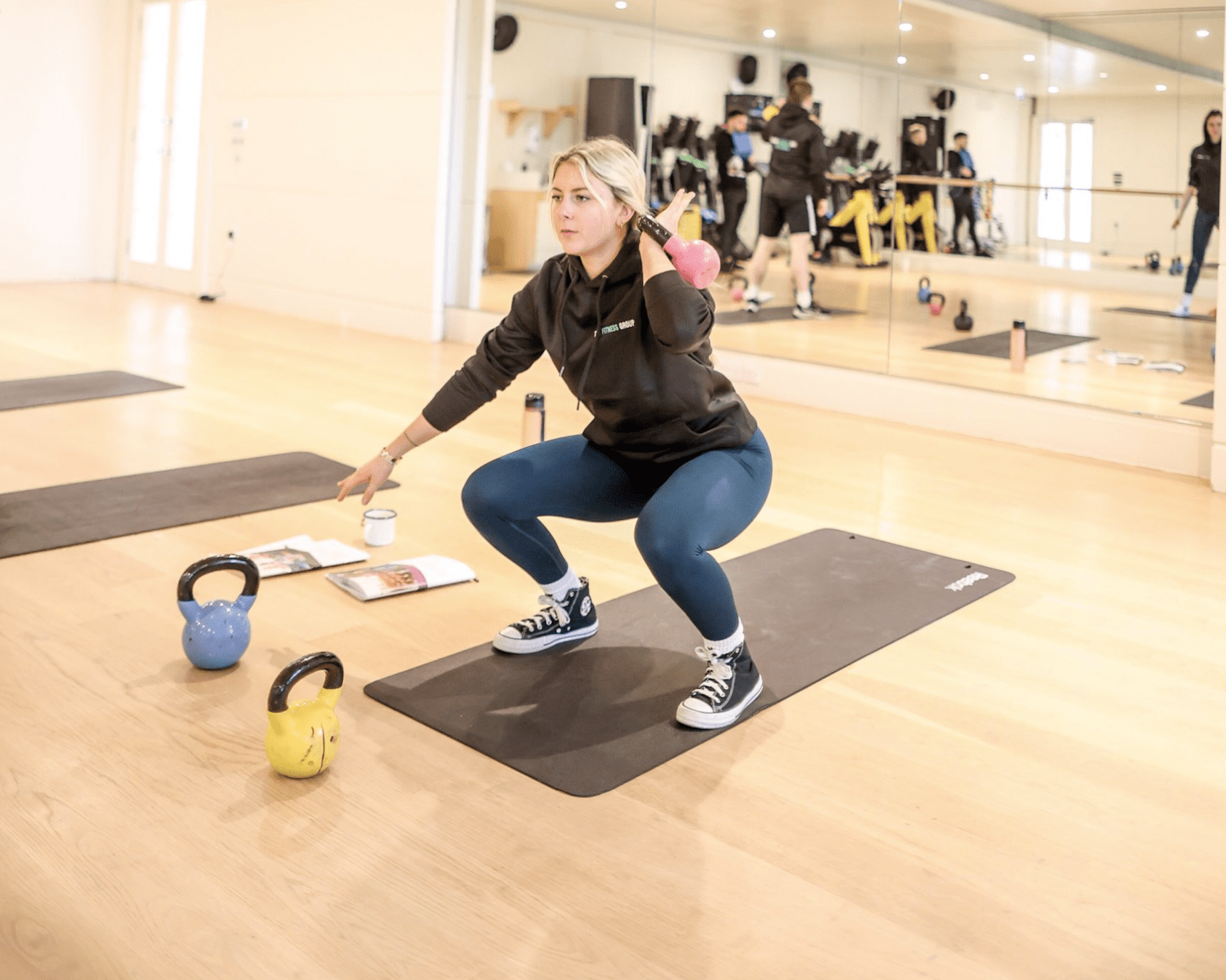 Female kettlebell student on courses at The Fitness Group