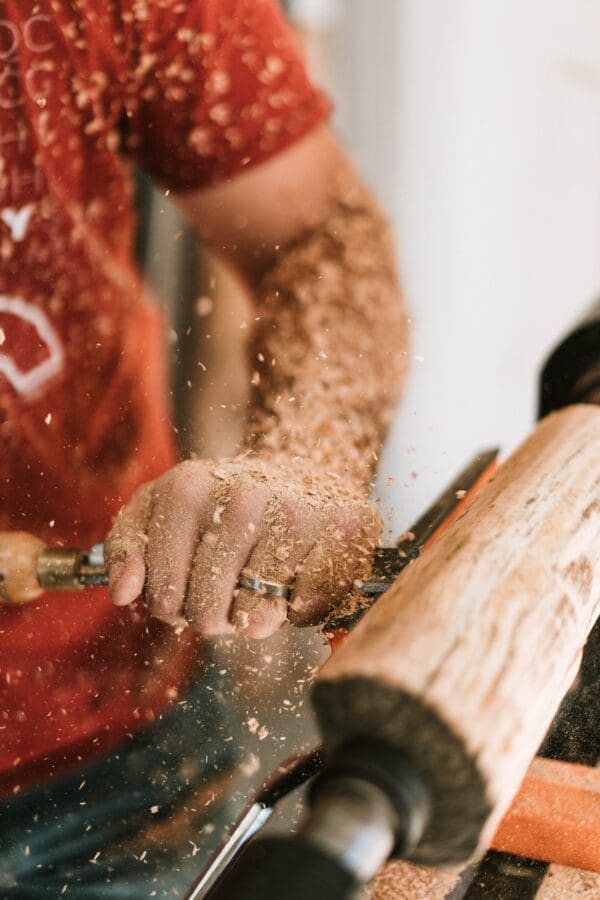 A carpenter doing woodwork, one of high paying jobs without a degree