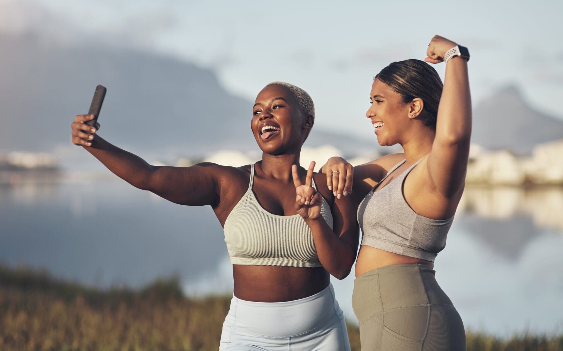 Shot of two women taking a selfie while out for a runtogether